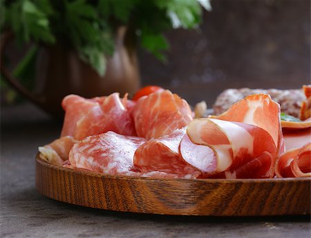 simsearch:400-06207145,k - Assorted deli meats - ham, sausage, salami, parma, prosciutto, bacon Stock Photo - Budget Royalty-Free & Subscription, Code: 400-08427813