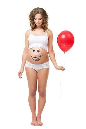 drawing girl face - Beautiful girl holding air balloon and looking at her pregnant belly with smily funny face drawn on it. Isolated. Foto de stock - Super Valor sin royalties y Suscripción, Código: 400-08427947