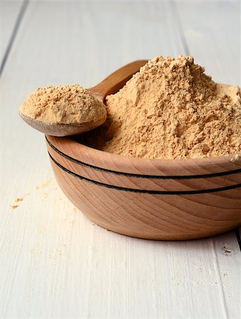 Maca root powder in a wooden bowl Stock Photo - Budget Royalty-Free & Subscription, Code: 400-08430795