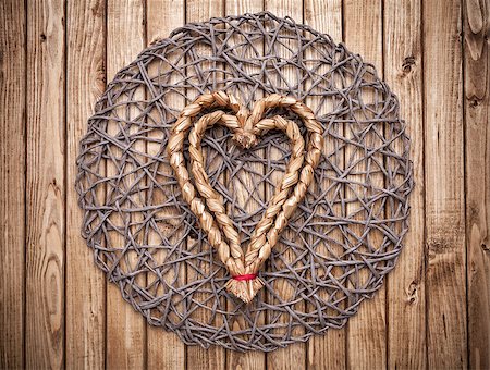 simsearch:400-08034169,k - Handmade heart on a wooden background Stock Photo - Budget Royalty-Free & Subscription, Code: 400-08431041