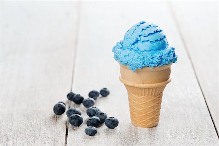 simsearch:400-05718903,k - Blue ice cream in waffle cone with blueberry fruit on white rustic wooden background. Stock Photo - Budget Royalty-Free & Subscription, Code: 400-08431193