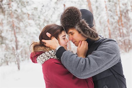 Happy Young Couple in Winter Park having fun.Family Outdoors Stock Photo - Budget Royalty-Free & Subscription, Code: 400-08431818