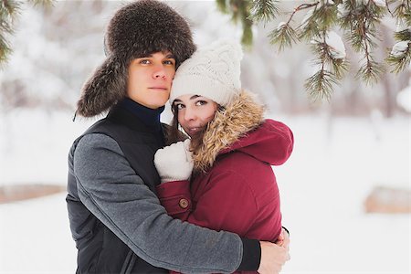 Happy Young Couple in Winter Park having fun.Family Outdoors Stock Photo - Budget Royalty-Free & Subscription, Code: 400-08431819