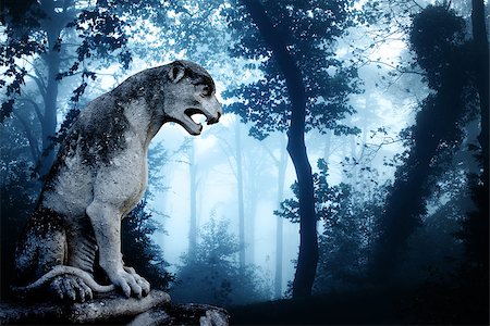 simsearch:400-05716374,k - Ancient lion statue and mysterious landscape of foggy forest Stock Photo - Budget Royalty-Free & Subscription, Code: 400-08432247
