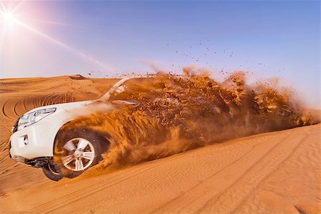 dune driving - Offroad vehicle bashing through sand dunes in the desert Stock Photo - Budget Royalty-Free & Subscription, Code: 400-08433935