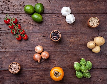 simsearch:400-05370250,k - Fresh and healthy organic vegetables and food ingredients on wooden background Stock Photo - Budget Royalty-Free & Subscription, Code: 400-08495121