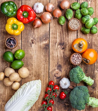simsearch:400-05370250,k - Fresh and healthy organic vegetables and food ingredients on wooden background Stock Photo - Budget Royalty-Free & Subscription, Code: 400-08495131