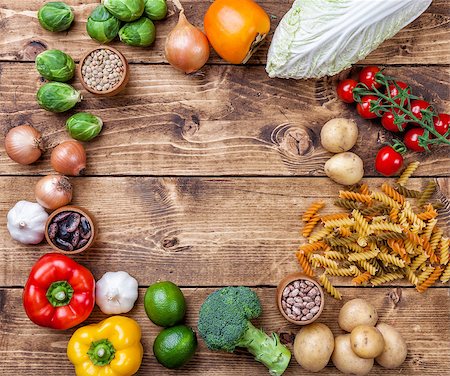 simsearch:400-05370250,k - Fresh and healthy organic vegetables and food ingredients on wooden background Stock Photo - Budget Royalty-Free & Subscription, Code: 400-08495132