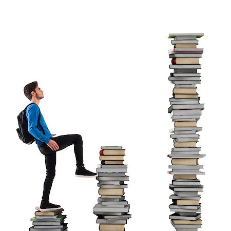 Boy with backpack climbs a books scale Foto de stock - Super Valor sin royalties y Suscripción, Código: 400-08505516
