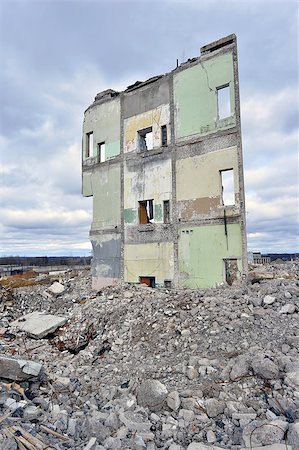 Pieces of Metal and Stone are Crumbling from Demolished Building Floors Stock Photo - Budget Royalty-Free & Subscription, Code: 400-08506615