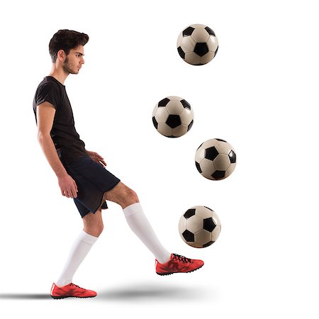 Teenage soccer player dribbling with four soccerball Stock Photo - Budget Royalty-Free & Subscription, Code: 400-08507091