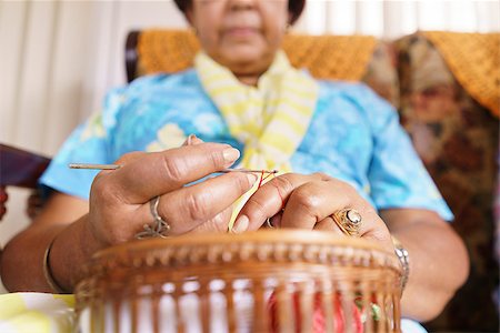 elderly african american women at the hospital - Old people in geriatric hospice: Senior woman sitting on sofa in hospital, knitting with ball of wool. The aged lady is pensive and focused on her hobby. Stock Photo - Budget Royalty-Free & Subscription, Code: 400-08507326