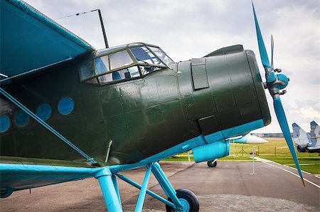 simsearch:400-04996557,k - Close-up of vintage biplane. Fuselage of the old single-engine aircraft with propeller. Retro airplane. Stock Photo - Budget Royalty-Free & Subscription, Code: 400-08503555