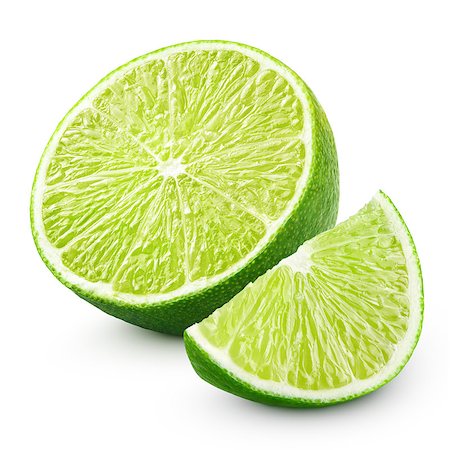 simsearch:400-06513460,k - Half and slice of lime citrus fruit isolated on white background with clipping path Stock Photo - Budget Royalty-Free & Subscription, Code: 400-08530239