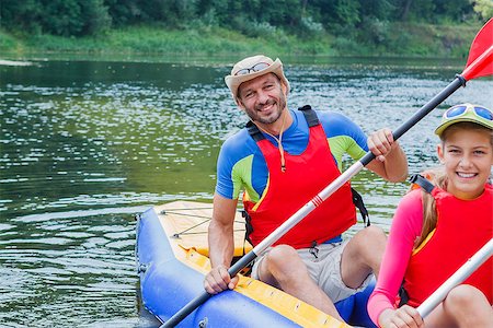 simsearch:400-05308802,k - Active happy family. Father with his daughter having fun together enjoying adventurous experience kayaking on the river on a sunny day during summer vacation Stock Photo - Budget Royalty-Free & Subscription, Code: 400-08574488