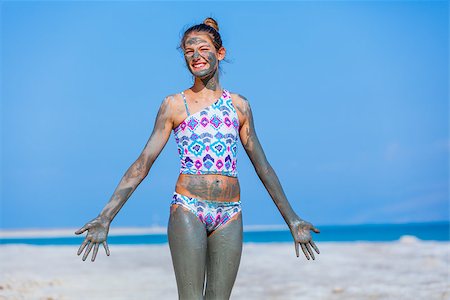 Beautiful girl taking Mud SPA At The Dead Sea, Israel. Stock Photo - Budget Royalty-Free & Subscription, Code: 400-08574772