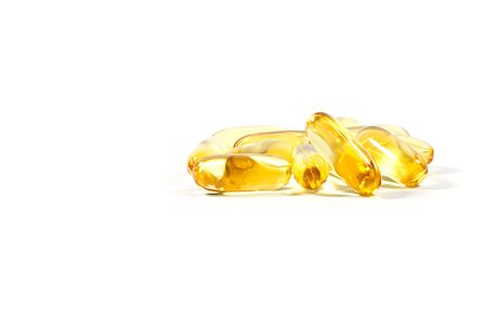 Fish oil capsules on white background, stock photo Stock Photo - Budget Royalty-Free & Subscription, Code: 400-08616592