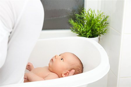 simsearch:400-04071604,k - Bathtime for a cute little newborn baby Stock Photo - Budget Royalty-Free & Subscription, Code: 400-08669350