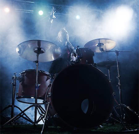 simsearch:400-04863651,k - Silhouette drummer on stage. Dark background, smoke spotlights Stock Photo - Budget Royalty-Free & Subscription, Code: 400-08729950