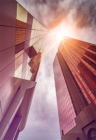 simsearch:649-07710289,k - modern office buildings in the evening sun seen from below, Dubai, UAE Stock Photo - Budget Royalty-Free & Subscription, Code: 400-08730679