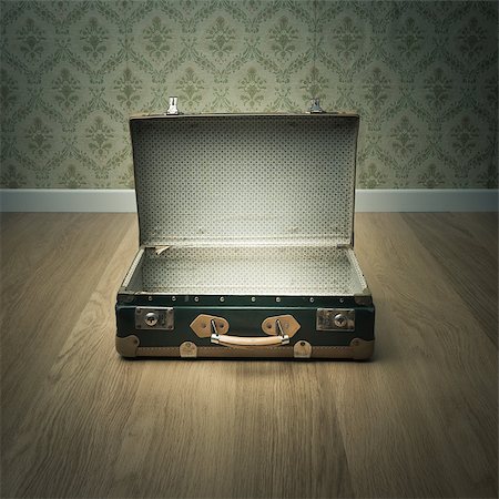 empty suitcase - Open vintage suitcase on wooden floor with vintage wallpaper on background. Stock Photo - Budget Royalty-Free & Subscription, Code: 400-08753410