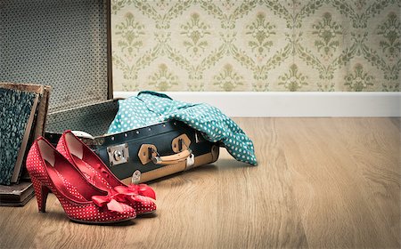 Open vintage suitcase with red shoes and dotted clothing, vintage wallpaper on background. Stock Photo - Budget Royalty-Free & Subscription, Code: 400-08753438