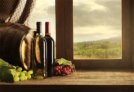 simsearch:846-05647552,k - Wine bottles, barrels and vineyard in sunset Stock Photo - Budget Royalty-Free & Subscription, Code: 400-08753448