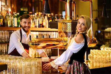 Bartender and waitress at the pub Stock Photo - Budget Royalty-Free & Subscription, Code: 400-08808113