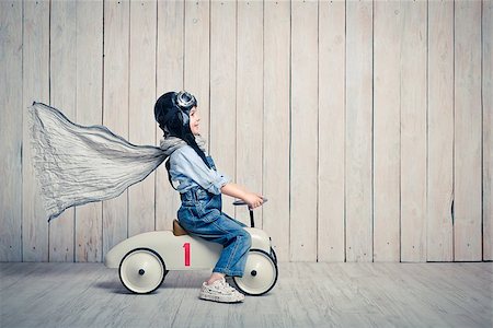 Little boy with a car in studio Stock Photo - Budget Royalty-Free & Subscription, Code: 400-08811450