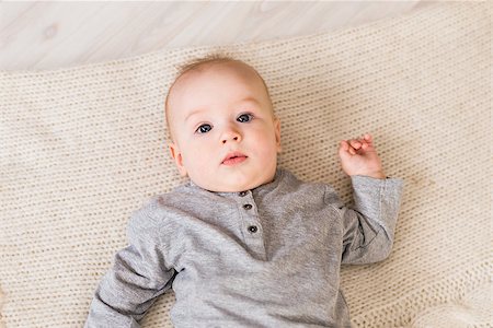 simsearch:400-04594888,k - bright portrait of adorable baby boy lying Stock Photo - Budget Royalty-Free & Subscription, Code: 400-08811955