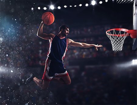 Player throws the ball in the basket in the stadium full of spectators Stock Photo - Budget Royalty-Free & Subscription, Code: 400-08834618