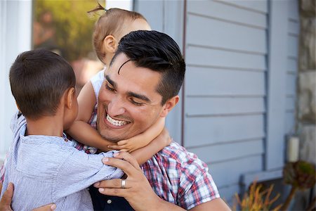 Father With Children Sitting On Steps Outside Home Stock Photo - Budget Royalty-Free & Subscription, Code: 400-08838106