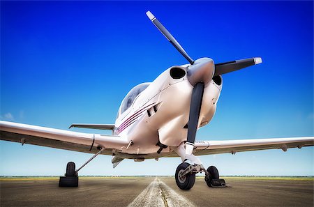 simsearch:400-04996557,k - sports plane on the runway Stock Photo - Budget Royalty-Free & Subscription, Code: 400-08864002