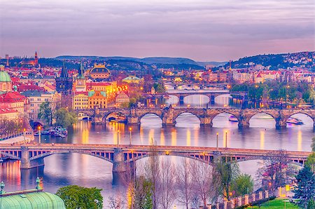 simsearch:400-05732427,k - Prague, Czech Republic: romantic bridges that crosses Vltava river in the sunset Stock Photo - Budget Royalty-Free & Subscription, Code: 400-08864306