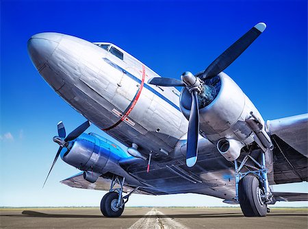 historic airplane on a runway Stock Photo - Budget Royalty-Free & Subscription, Code: 400-08864595