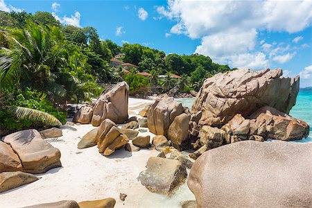 simsearch:400-05745636,k - Beautifully shaped granite boulders and a perfect white sand at the Anse Patates beach, La Digue island, Seychelles Stock Photo - Budget Royalty-Free & Subscription, Code: 400-08887684