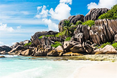 simsearch:400-05745636,k - Beautifully shaped granite boulders and a perfect white sand at Grand Anse, La Digue island, Seychelles Stock Photo - Budget Royalty-Free & Subscription, Code: 400-08887686