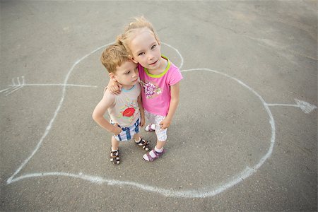 Love concept. Couple of kids loving each other hugging and kissing. Stock Photo - Budget Royalty-Free & Subscription, Code: 400-08889030