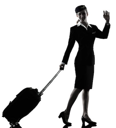 full length photograph cabin crew - one caucasian Stewardess cabin crew  woman Saluting isolated on white background in  silhouette Stock Photo - Budget Royalty-Free & Subscription, Code: 400-08899168