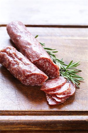 simsearch:400-06207145,k - salami sausage with rosemary on a wooden board Stock Photo - Budget Royalty-Free & Subscription, Code: 400-08890286