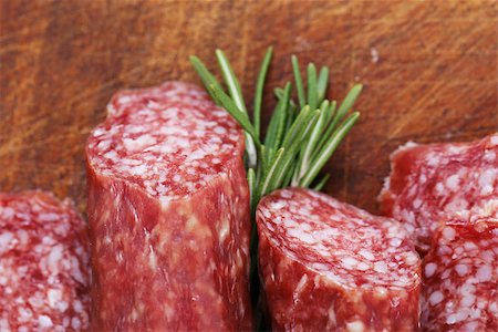simsearch:400-06207145,k - salami sausage with rosemary on a wooden board Stock Photo - Budget Royalty-Free & Subscription, Code: 400-08890288