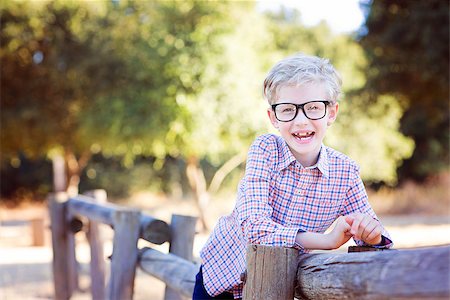simsearch:695-03381153,k - cute school boy student in glasses enjoying time outdoor, back to school concept Stock Photo - Budget Royalty-Free & Subscription, Code: 400-08891198