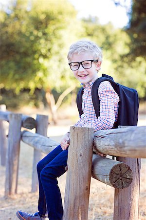 simsearch:695-03381153,k - cute school boy student in glasses and with backpack enjoying time outdoor, back to school concept Stock Photo - Budget Royalty-Free & Subscription, Code: 400-08891200