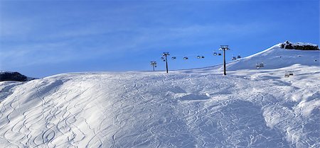 simsearch:400-04636750,k - Panoramic view on sunlight off-piste slope at morning. Greater Caucasus, Mount Shahdagh, Azerbaijan. Stock Photo - Budget Royalty-Free & Subscription, Code: 400-08891356