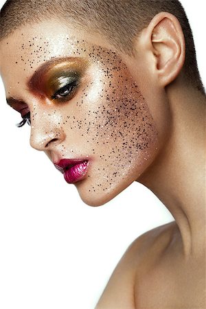 Close up of woman face with glitter on face and colored make up. Stock Photo - Budget Royalty-Free & Subscription, Code: 400-08891543