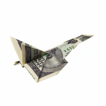 simsearch:400-08891312,k - origami airplane from banknotes on a white background Stock Photo - Budget Royalty-Free & Subscription, Code: 400-08892719