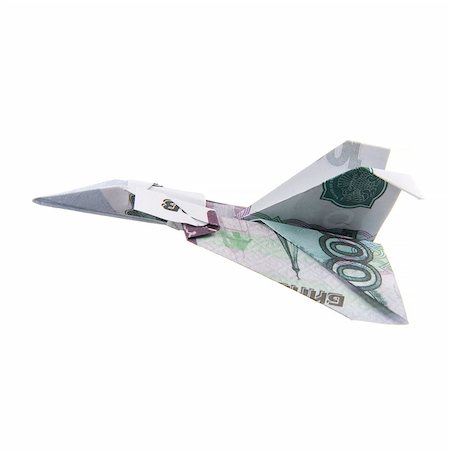 simsearch:400-08891312,k - origami airplane from banknotes on a white background Stock Photo - Budget Royalty-Free & Subscription, Code: 400-08892720