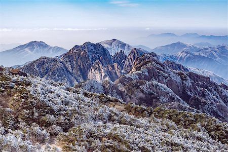 simsearch:400-04587823,k - Winter sunrise landscape in Huangshan National park. Park located in Anhui province in China. It is a UNESCO World Heritage Site. Stock Photo - Budget Royalty-Free & Subscription, Code: 400-08892798