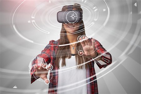 Woman Using Virtual Reality Headset Foto de stock - Super Valor sin royalties y Suscripción, Código: 400-08938153