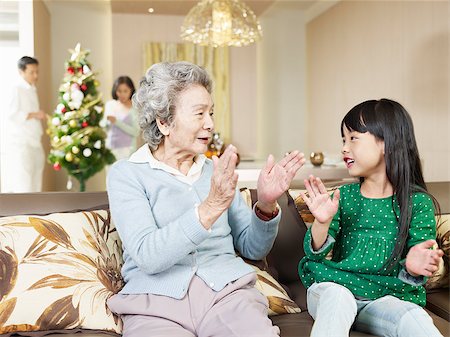 simsearch:400-07221782,k - grandma and granddaughter playing at home Stock Photo - Budget Royalty-Free & Subscription, Code: 400-08955805